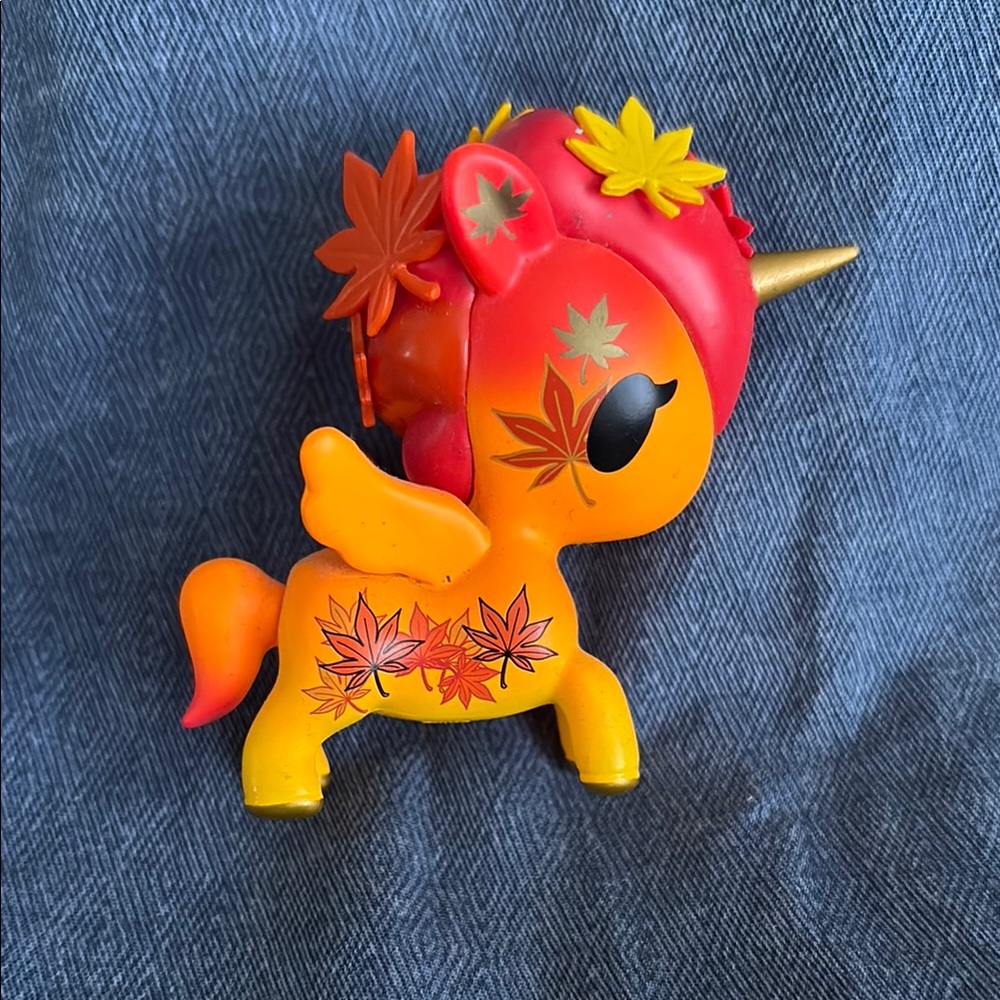 Orange and Red Unicorn Figurine
